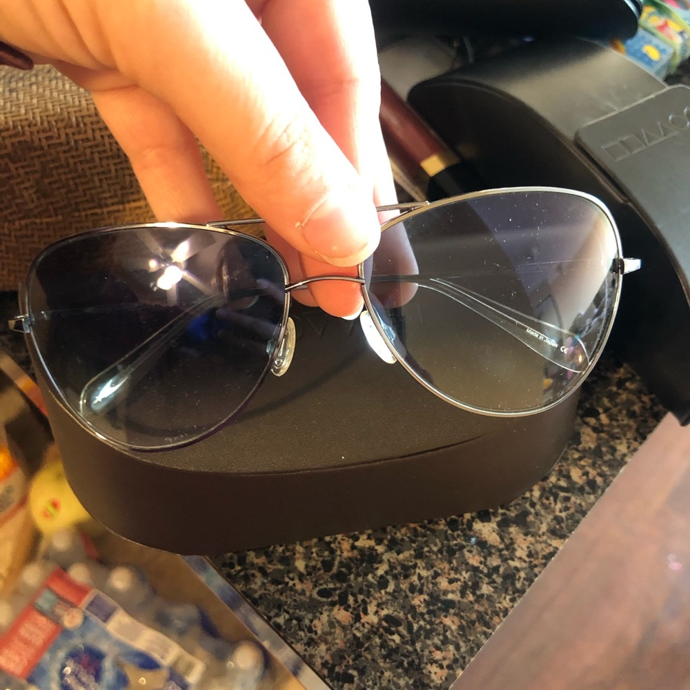 Oliver People’s Photochromic Aviators Sunglasses